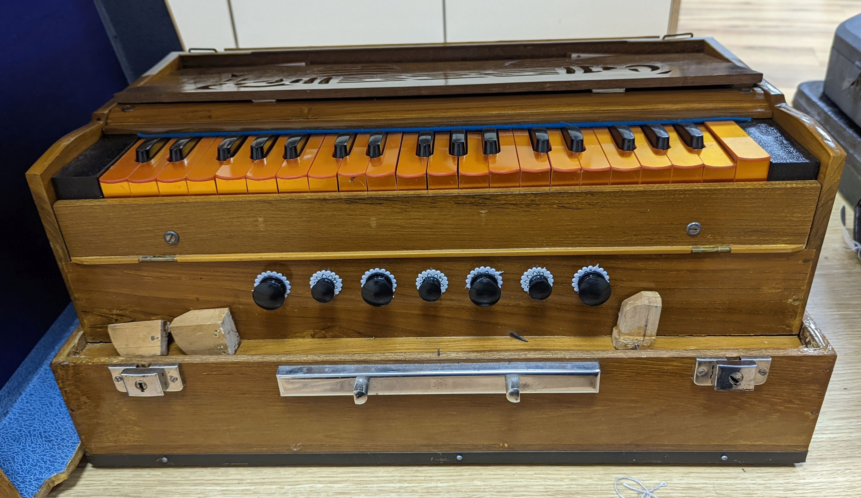A hardwood cased harmonium